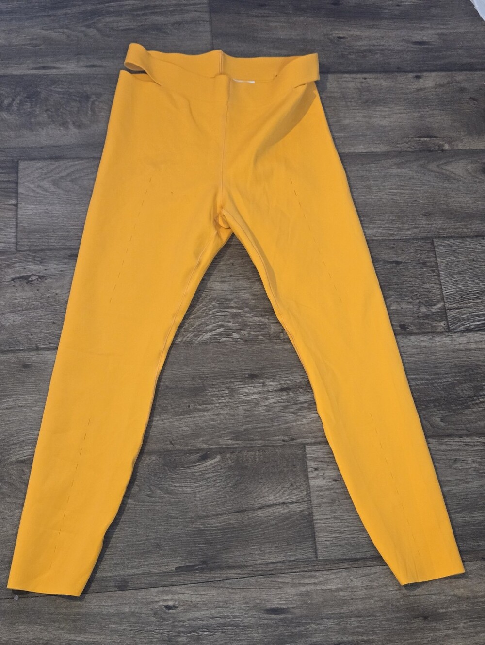 Nike Dri-FIT Sports Leggings in Yellow